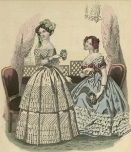 kobiety w loży z bukietami kwiatów XIX w.
Kwiaty w XIX w.